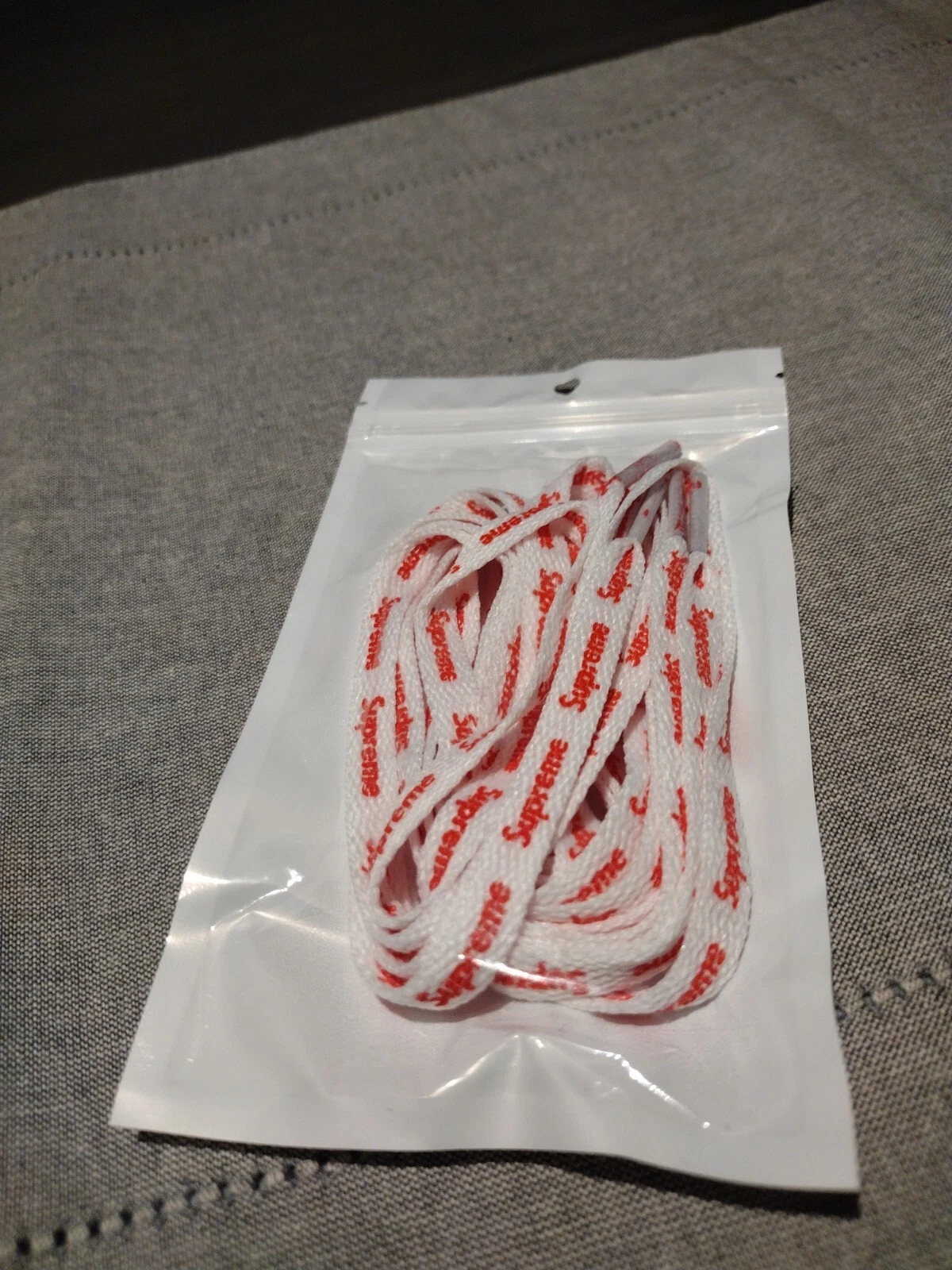 Lacet suprême blanc et rouge