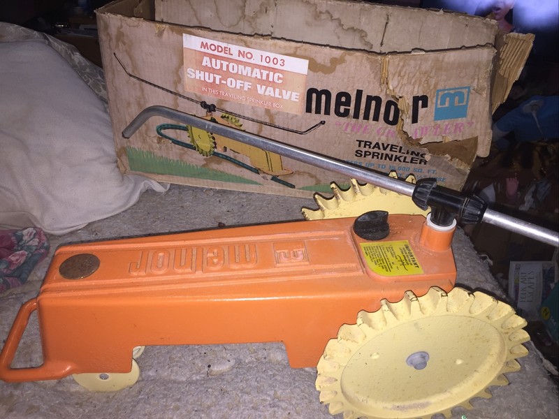 Vintage Melnor traveling sprinkler model 1003 automatic shut off valve