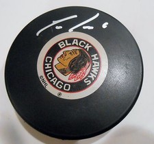 Trevor Daley Signed Chicago Blackhawks Hockey Puck w/COA