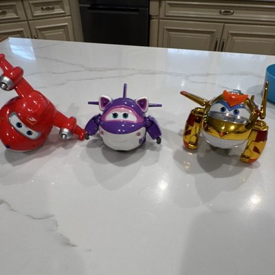 Super Wings Transforming Aircraft Toy Figures Set of 3 - Red, Purple, Gold