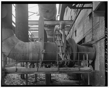 24. LOOKING SOUTH AT CLEAN BLAST FURNACE GAS PIPE LEADING INTO THE EASTERN WALL