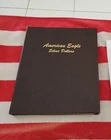 33 silver eagles lot in Dansco folder