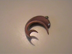 VINTAGE 1960'S WOODEN DOLPHIN OR PORPOISE PENDANT OR CHARM WITH SPARKLE EYE