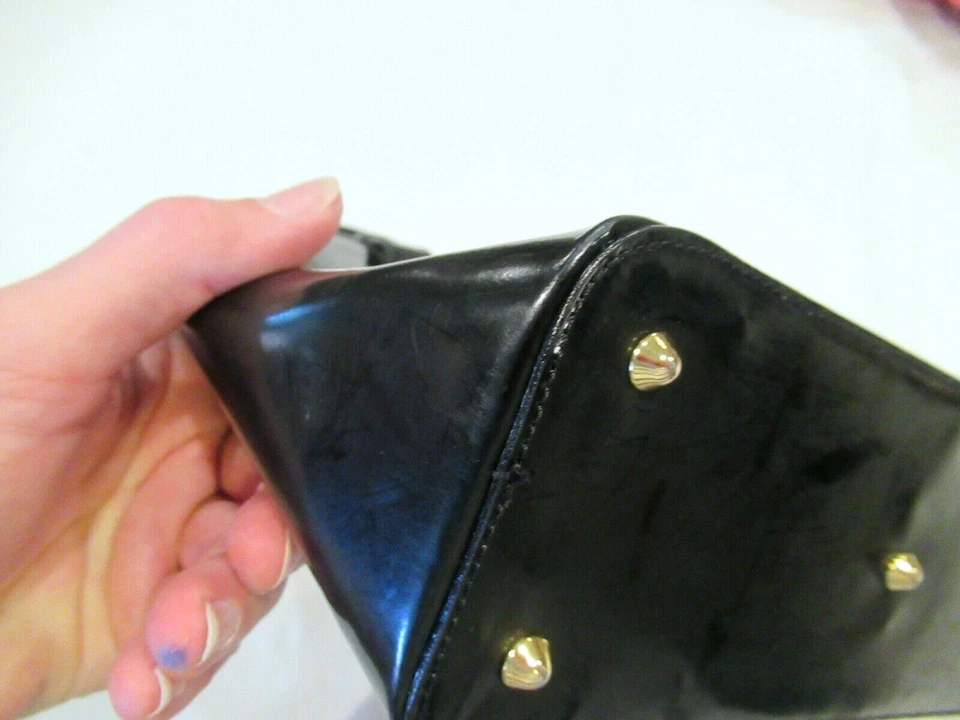 Monedero Jaeger de cuero negro con asa superior, hecho en Italia Foto 4 de 4