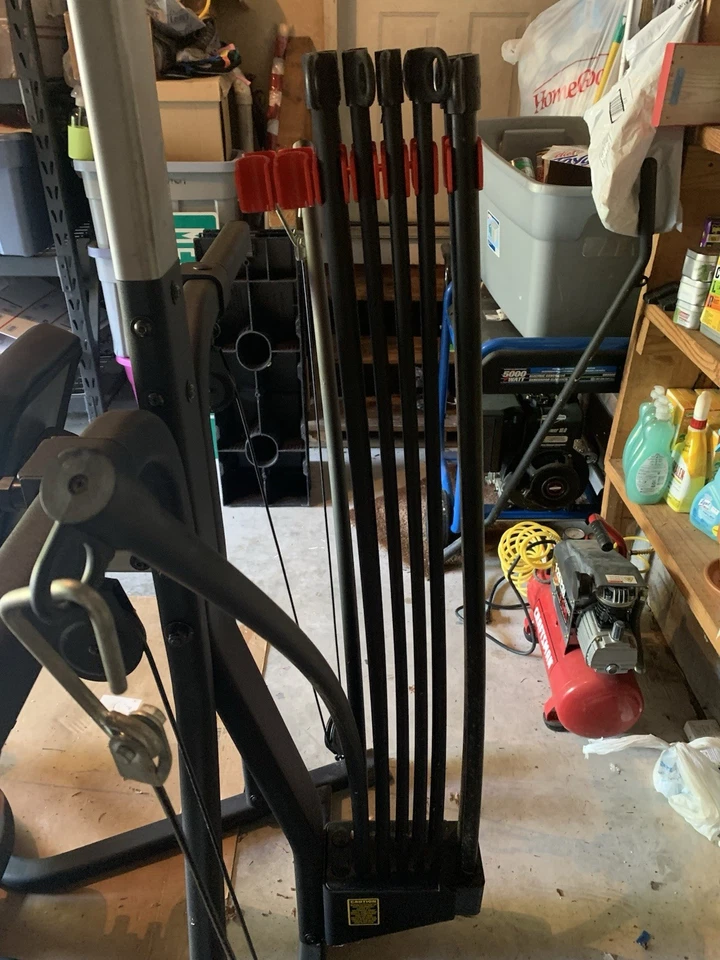 The Bowflex Xtreme Home Gym, 310 Lbs of Resistance, Squat, Curl, And Lat Bars - Image 3 of 4