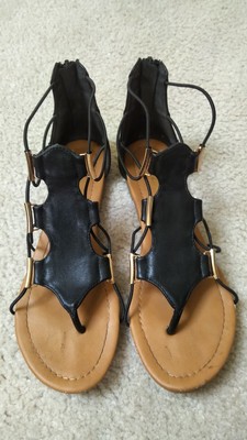 black and gold gladiator sandals