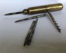 Rare antique vintage corkscrew multitool roundlet di inizi '900.