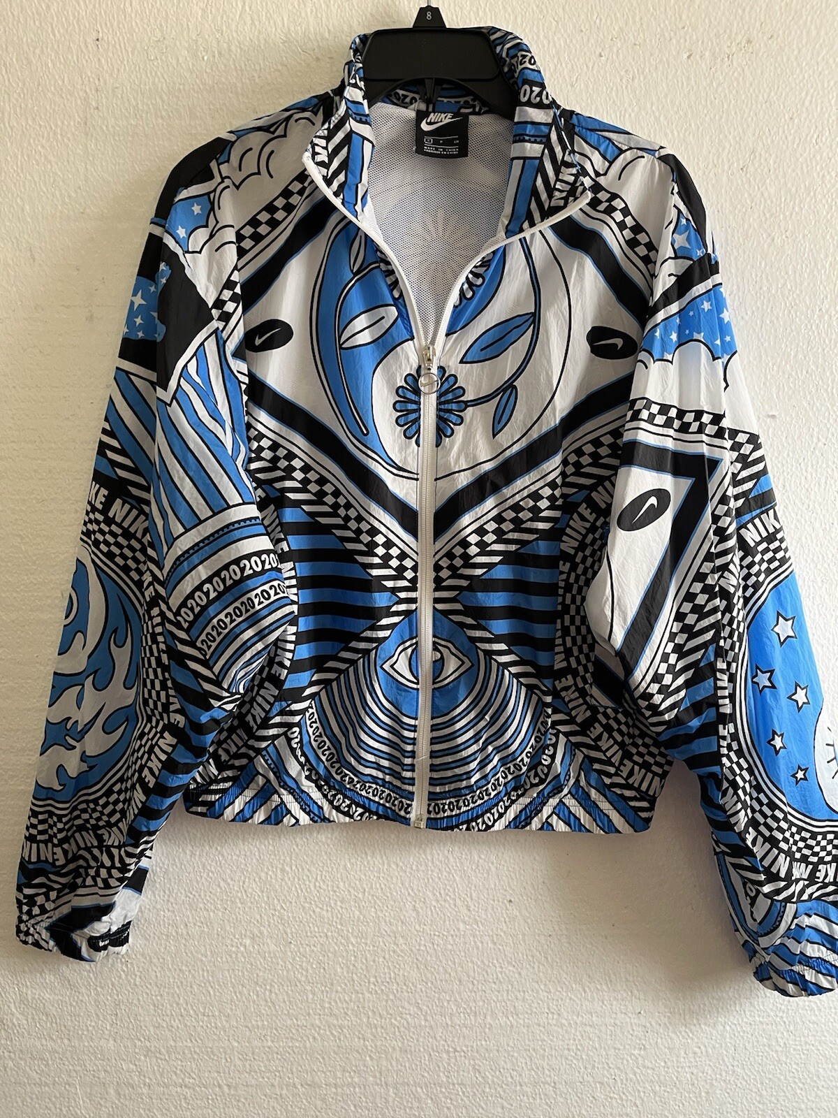 Chaqueta de vaso de viento con estampado de ojos Nike Yin Yang para mujer RARA 2020 talla pequeña