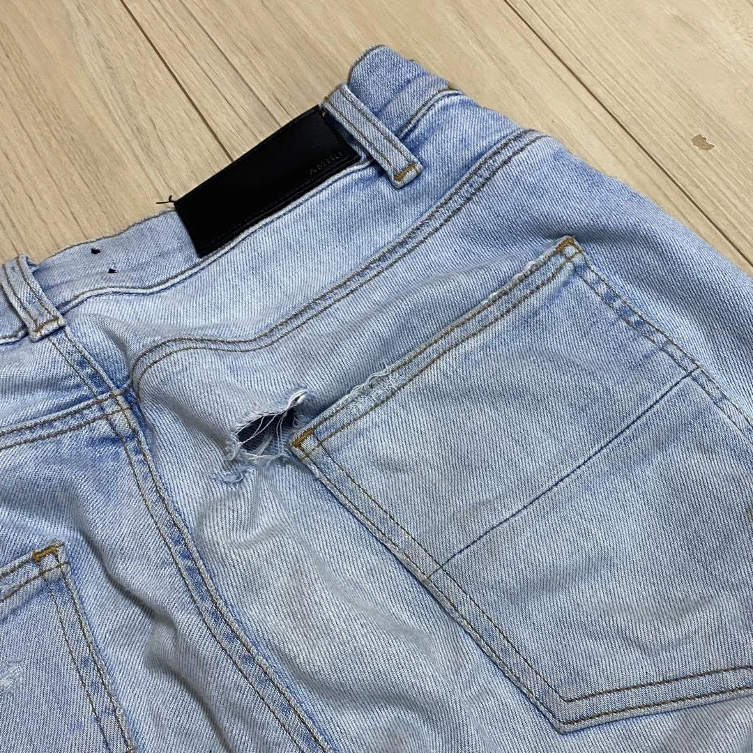 Pantaloni denim originali AMIRI Crash Shotguns