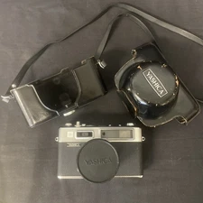 Yashica Vintage Electro 35 w/ Yashinon DX 45mm f1.7 Lens W/Case- Shutter Works