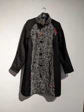 Black Coat With Colourful Panels.