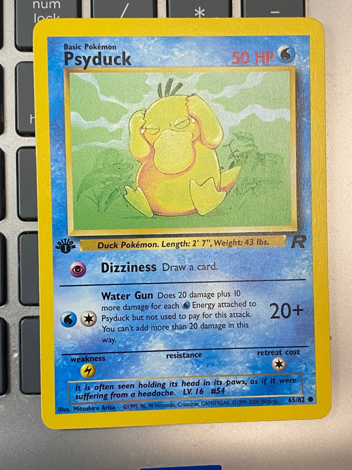 Pokemon Psyduck 65/82 Team Rocket 1st Edition nm condition card Common