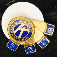 Kiwanis Lapel Pin with 4 number attachments Includes backing