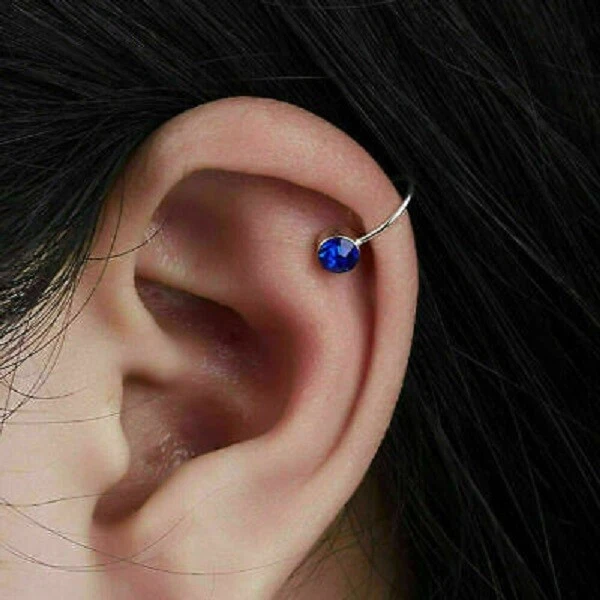 Pendientes para mujer con brazalete de zafiro azul creado en laboratorio de 0,10 quilates acabado en oro blanco de 14 k Foto 2 de 4