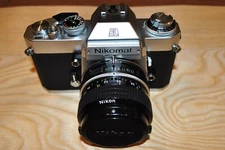 Nikon Nikomat EL 35mm SLR Film Camera Nikkor 28mm 3.5 Lens NICE