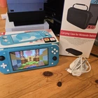 Nintendo Switch Lite Turquoise 32GB Console - Hall Effect sticks , case & games