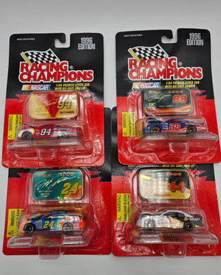 1996 Edition Racing Champions 1/64 and diecast emblem combo, lot
