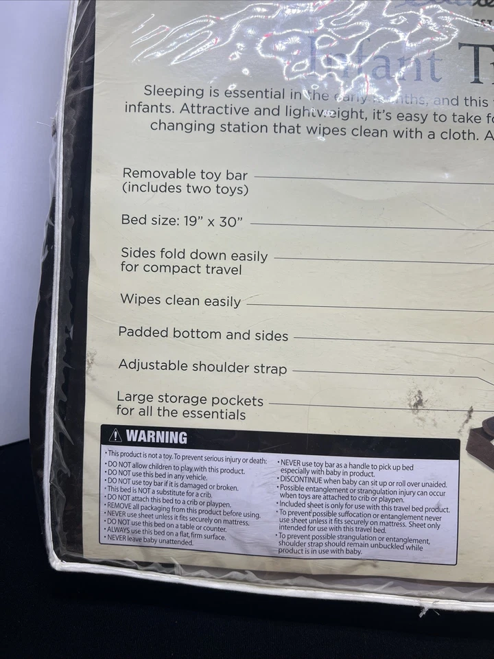 Cama de viaje infantil Eddie Bauer acolchada con barra de juguete 19”x30” tiene correa para el hombro Foto 3 de 4