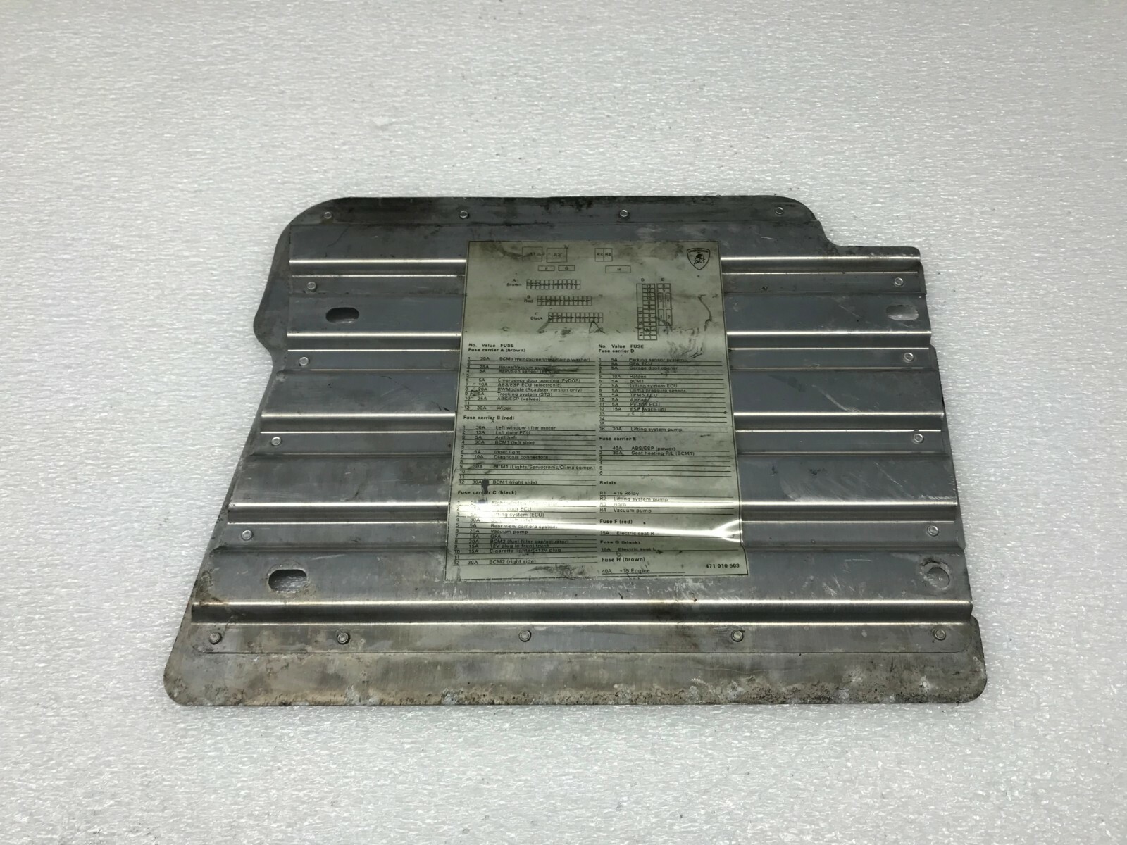 LAMBORGHINI AVENTADOR LP700 FUSEBOX COVER FOOTREST NAMEPLATE OEM 471010503