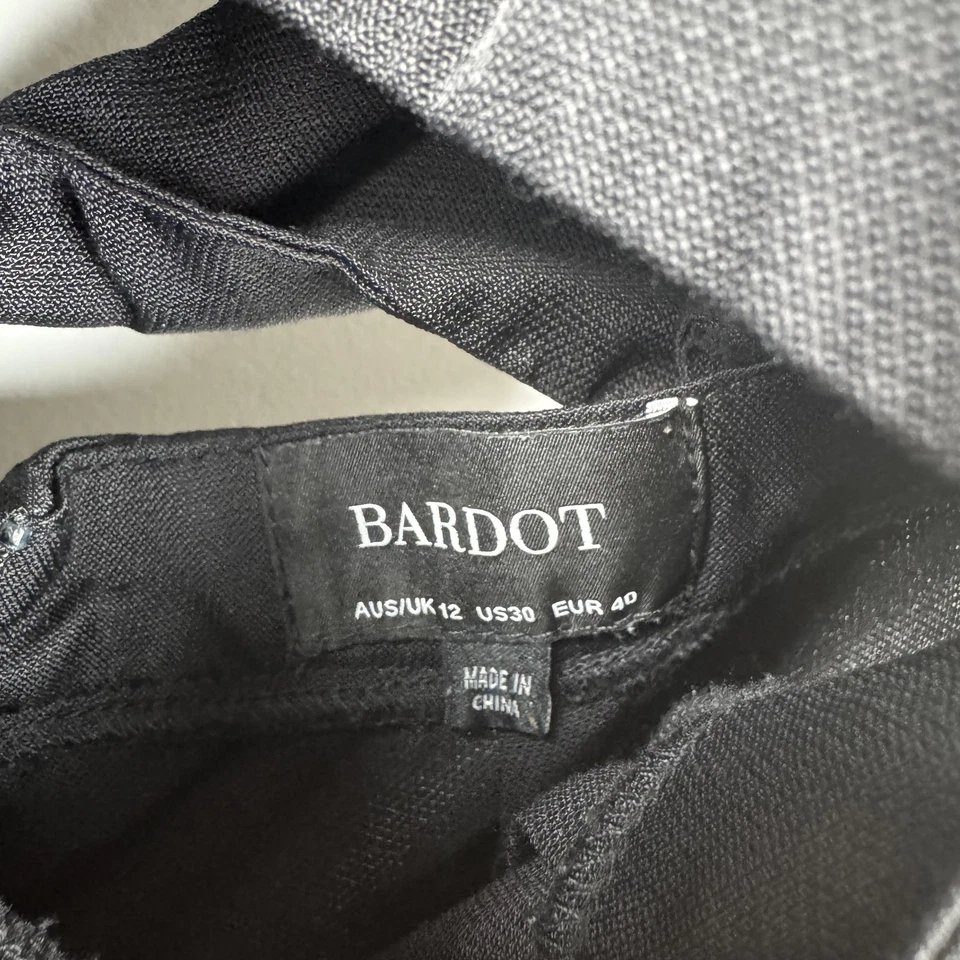 Mono Bardot para mujer mediano negro pierna ancha tiras lazo trasero bolsillos recortados Foto 2 de 4