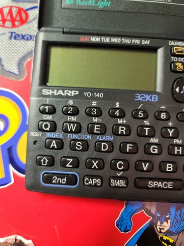 Sharp ZQ-2200 32kb PDA ELECTRONIC PC ORGANISATEUR PERSONNEL CALCULATRICE POCHE noir - Photo 4 sur 8