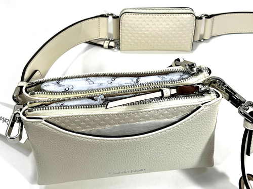 Calvin Klein Tracolla a tracolla con cerniera cromata firmata in rilievo prezzo al dettaglio $148 *nuova con etichette* - Foto 3 di 7