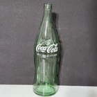 Vintage 26 oz. Coca Cola green bottle in good condition