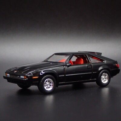 2024 AUTO WORLD 1983 TOYOTA CELICA SUPRA BLACK IMPORT LEGENDS REL