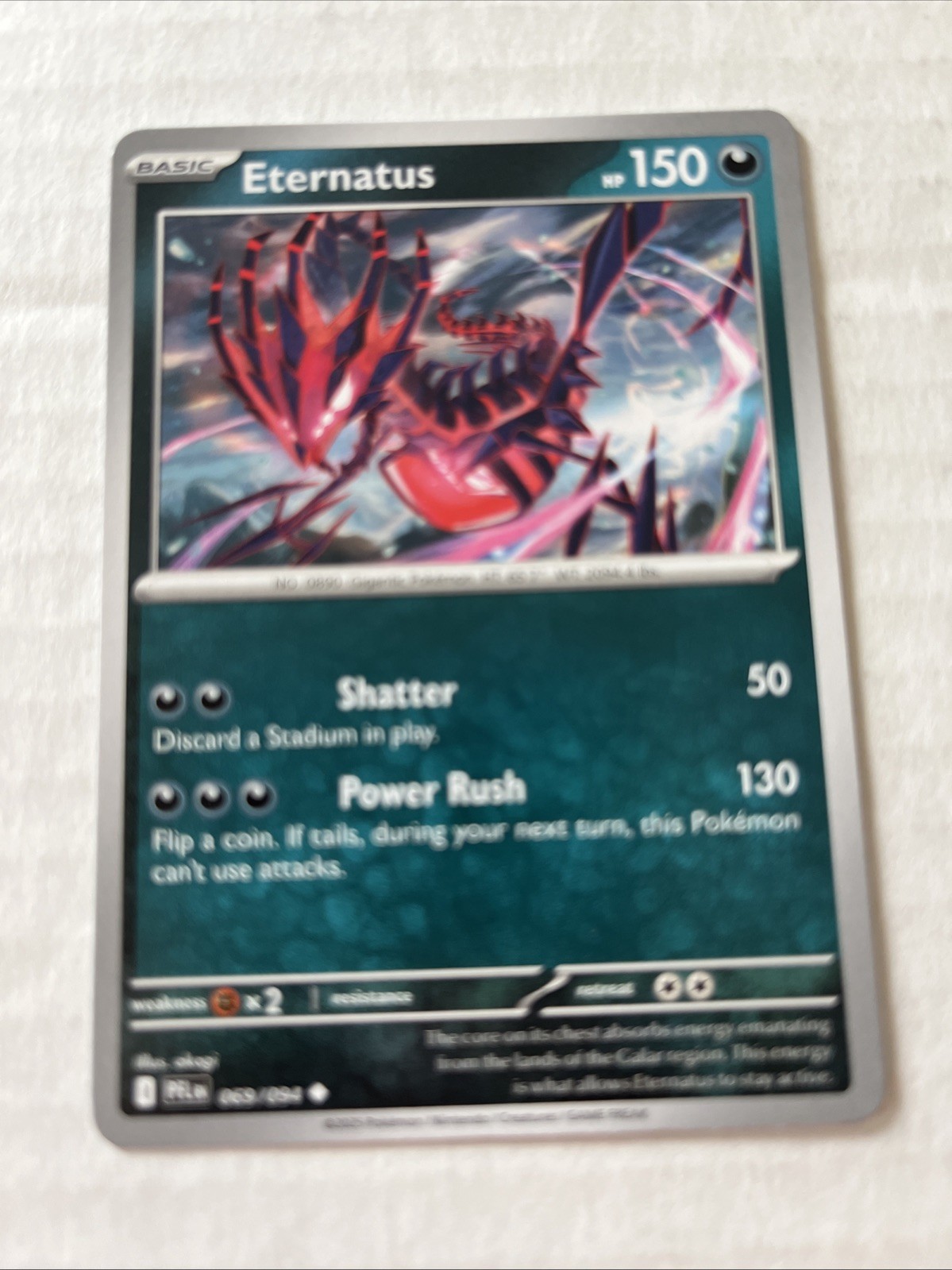 Eternatus 069/094 Me02: Phantasmal Flames Regular