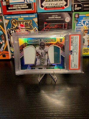 2021 Panini Spectra - Rising Rookie MT Travis Etienne #RRM-neon Splatter /8