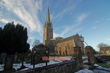 PHOTO KINGS SUTTON CHURCH THE 198 FOOT SPIRE OF THE CHURCH OF ST PETER & ST PAU