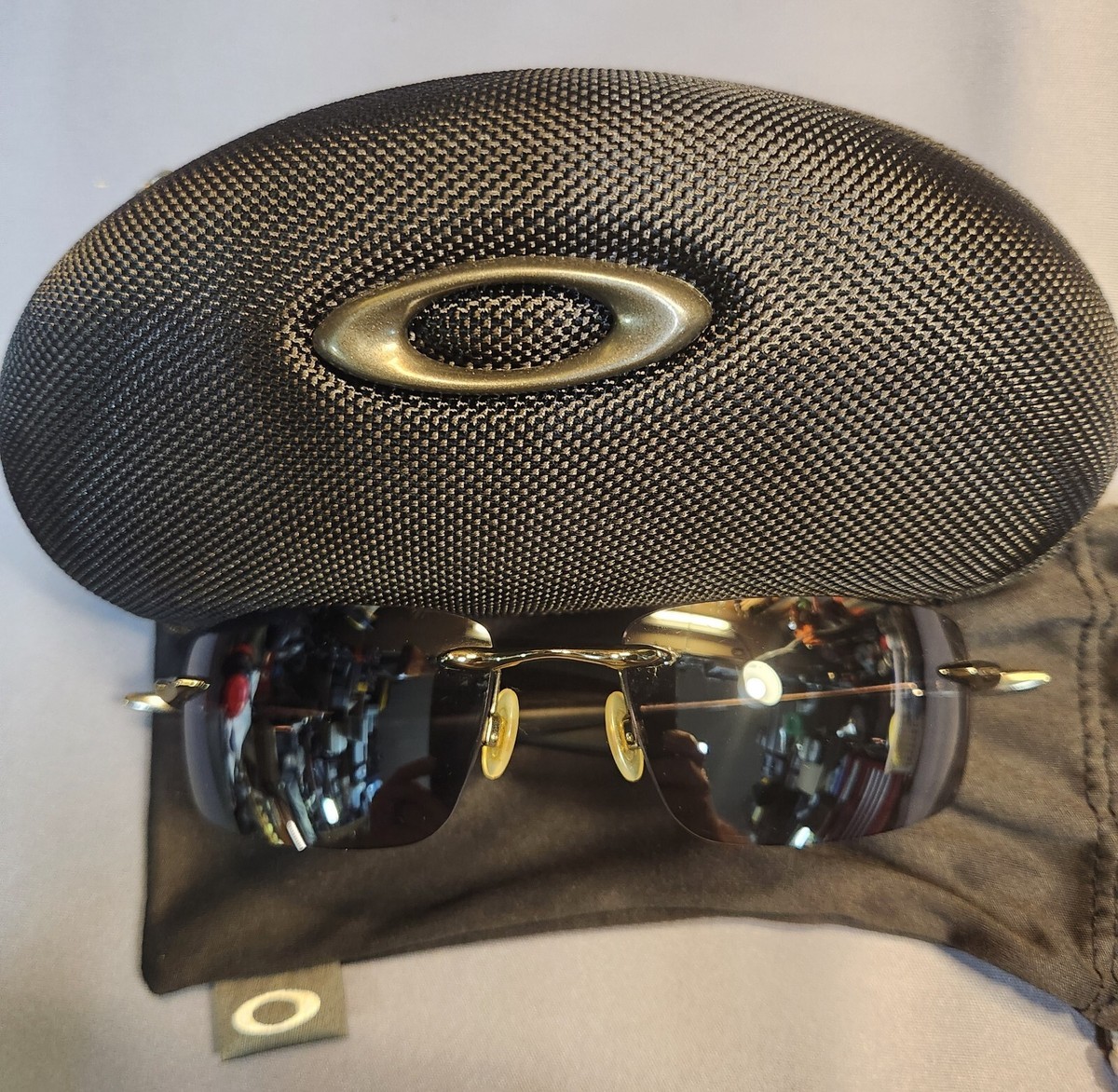 オークリーサングラス　why8 Oakley Why 8 Polished Chrome Sunglasses Grey Lens 05-873