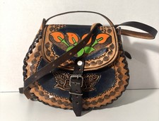 Hand-Tooled Leather Shoulder Bag with a Floral Design