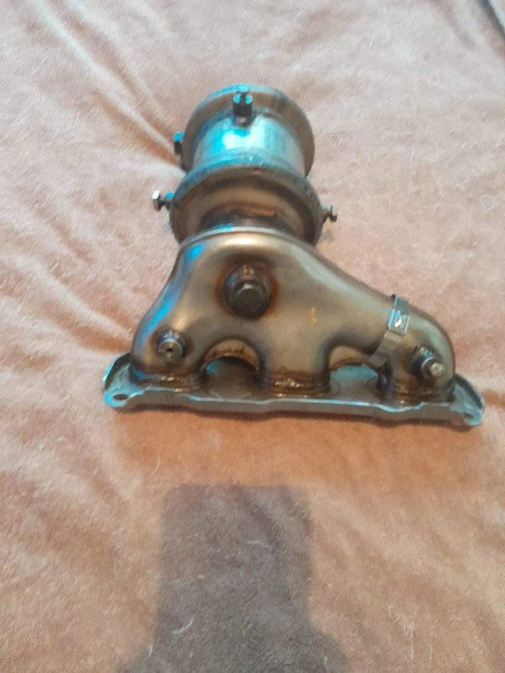 Convertidor catalítico colector de escape NAPA 14702 para Kia Sorento 2017 AWD 3,3 L Foto 2 de 4