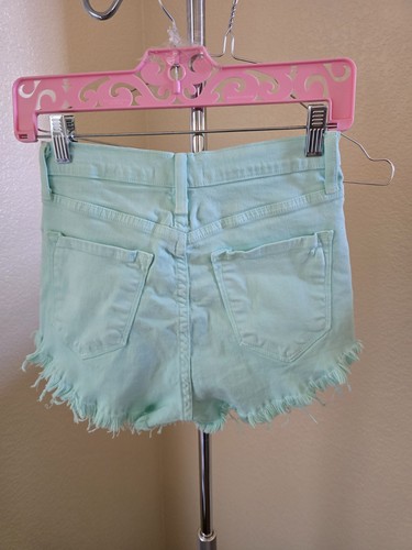 Vibrant MIU Cut Off Shorts - Picture 2 of 3