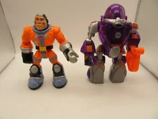 2003 Hero Astrobot Transforming Robot and Roger Houston Astronaut