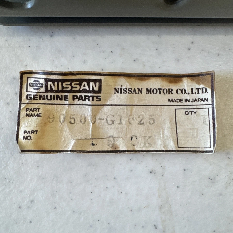 Pestillo de bloqueo de manija de puerta trasera NOS para carrocería rígida Datsun Nissan 720 D21 1980-1997 Foto 2 de 4