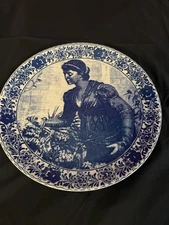 Chemkefa Delft Blauw Holland Decorative Plate Featuring A Girl Plucking Flowers