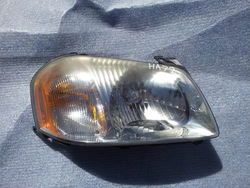 Faro lateral derecho del pasajero Mazda Tribute 2001 2002 2003 2004 fabricante de equipos originales de fábrica  - Imagen 1 de 3