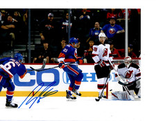 NEW YORK ISLANDERS RYAN PULOCK SIGNED SLAP SHOT 8X10