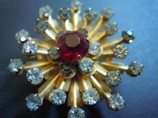 Brooch: Starburst Flower Red Clear Rhinestone Pendant Vintage