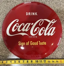  1950's Drink Coca-Cola Sign of Good Taste 16" Painted Metal Button Sign W/ Brkt