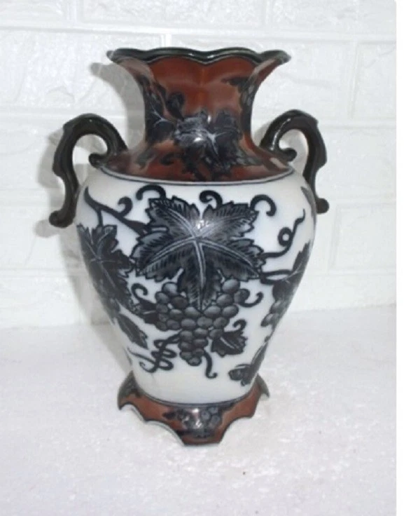 Ceramic decorative vase with handles