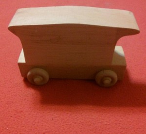 unfinished wooden train set