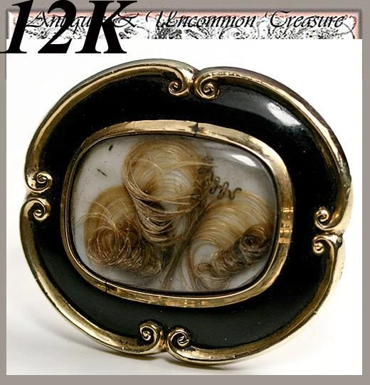 Mourning brooch with hair outlet