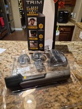 Microtouch, titanium trim at home haircut and body groomer.