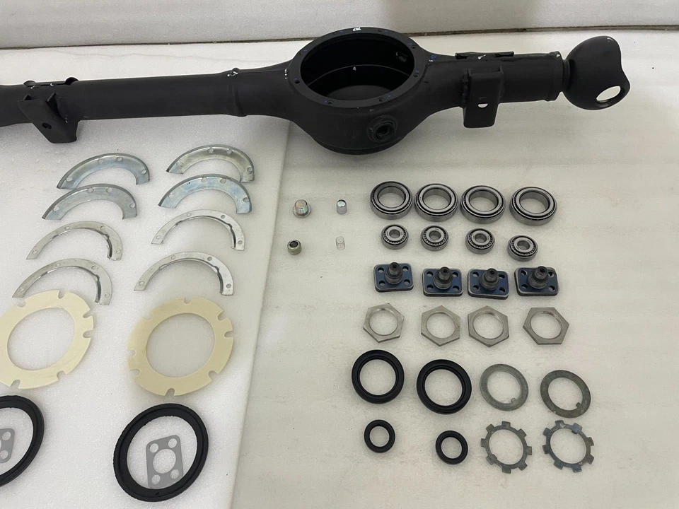 OEM SUZUKI SAMURAI 85-95 COMPLETE FRONT AXLE HOUSING KIT 46480M83304 |Fit For Foto 4 de 4