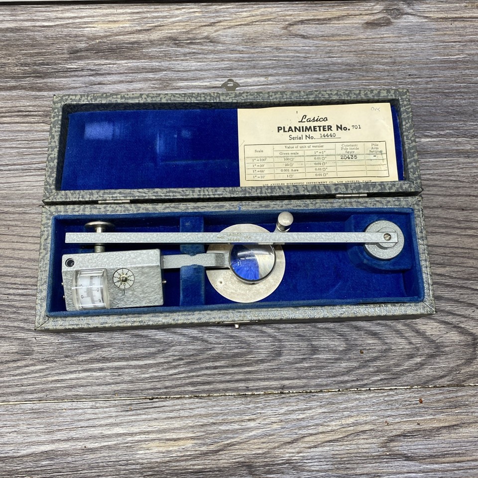 A mid-century Los Angeles-made planimeter — a beautiful analog instrument that physically measures area by tracing curves, pure mechanical wizardry.