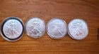 (Lot of 4) American Silver Eagle Unc 1oz .999 Fine Silver, in capsules