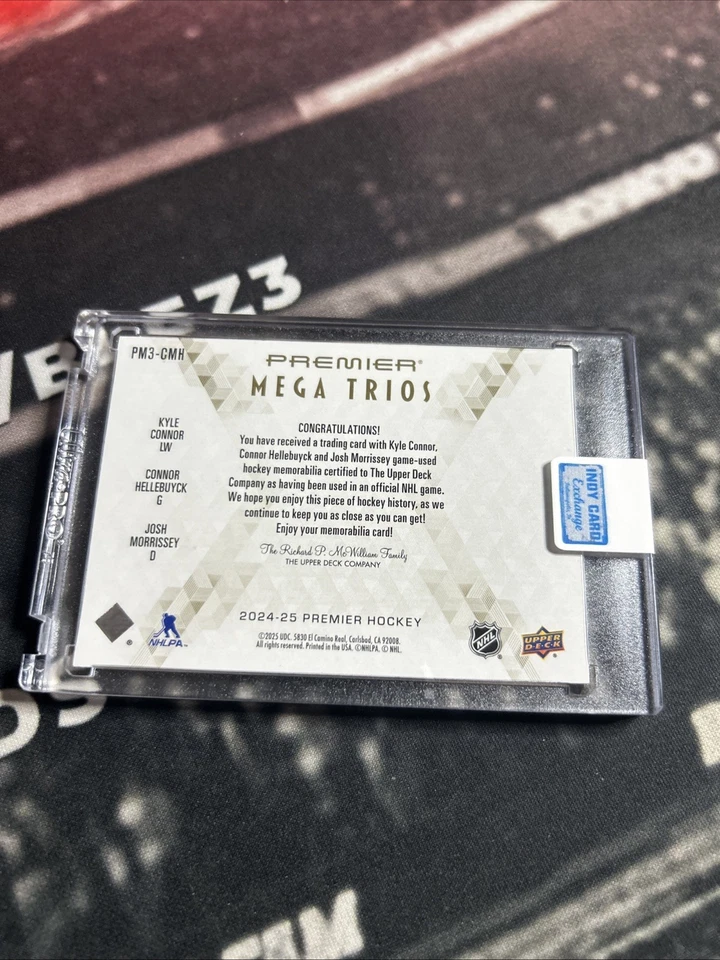 2024-25 Premier Mega Trios Kyle Connor, Connor Hellebuyck, Josh Morrissey /25 - Image 3 of 4